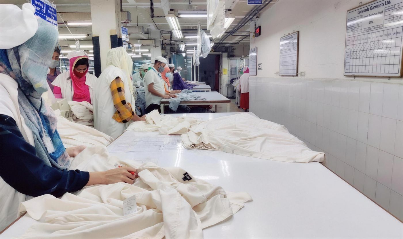 Fabric laid out on cutting tables
