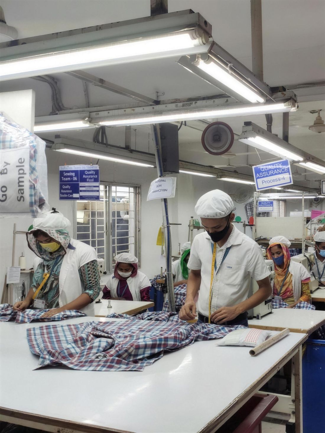 Quality check of finished shirts